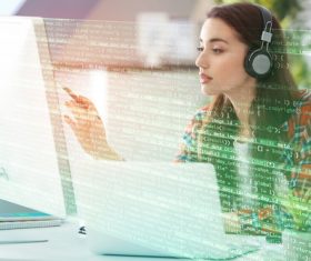 Young pretty female programmer Stock Photo 02