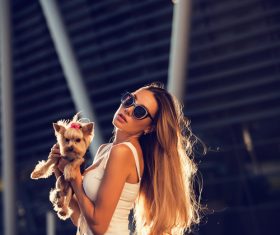 fashion woman is holding pet dog posing Stock Photo 15