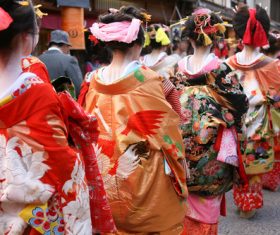 geisha wearing a Japanese kimono cruises the street Stock Photo