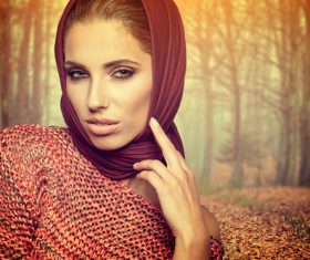 Autumn woman wearing sweater and headscarf Stock Photo