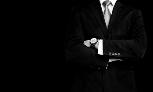 Black suit and watch Stock Photo