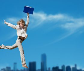 Business lady jumping up Stock Photo