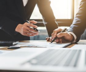 Businessman filling in data Stock Photo