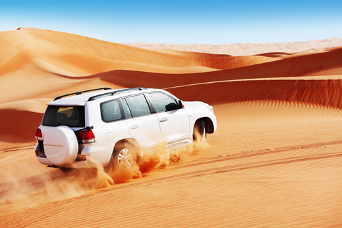 Car in the desert Stock Photo