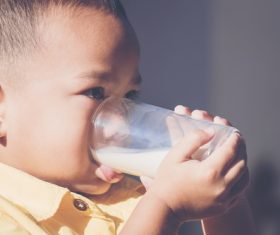 Child drink milk Stock Photo 04