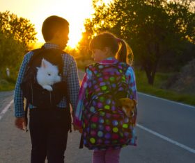 Children carrying pets Stock Photo