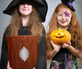 Children dressed as Halloween ghosts Stock Photo 01