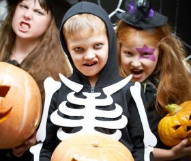 Children dressed as Halloween ghosts Stock Photo 02