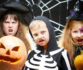 Children dressed as Halloween ghosts Stock Photo 04