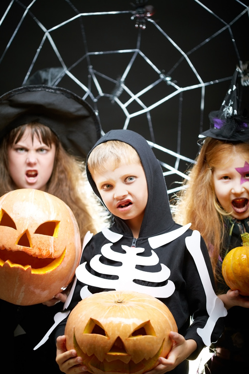 Children dressed as Halloween ghosts Stock Photo 04