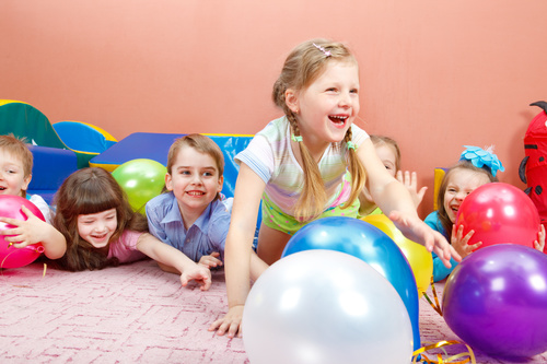 Cute children playing together Stock Photo
