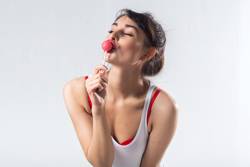 Eat Lollipop woman Stock Photo