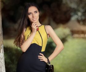 Elegant beautiful woman holding handbag Stock Photo