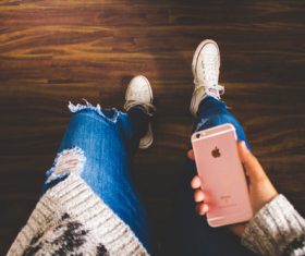 Girl holding phone Stock Photo