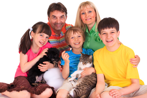 Happy family and pet Stock Photo