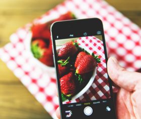 Iphone capturing fruit photo Stock Photo