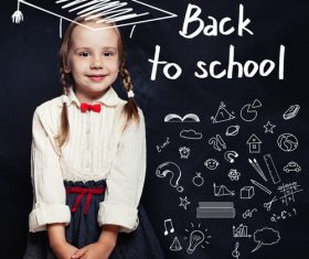 Little girl standing in front of the blackboard Stock Photo 03