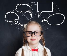 Little girl standing in front of the blackboard Stock Photo 04