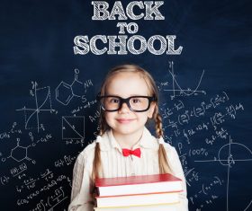 Little girl standing in front of the blackboard Stock Photo 08