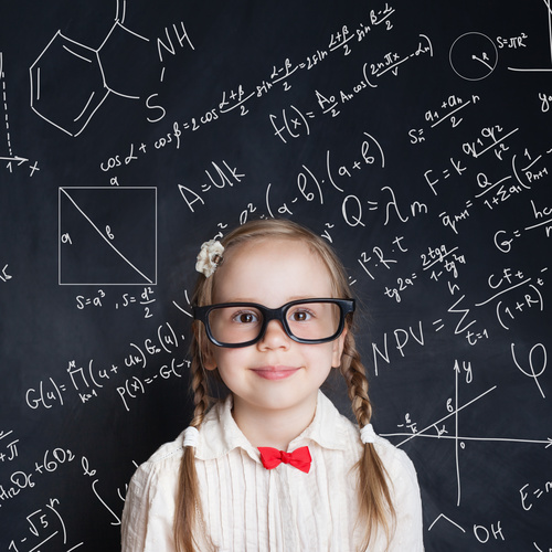 Little girl standing in front of the blackboard Stock Photo 09