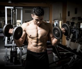 Man doing body building in the gym Stock Photo 03
