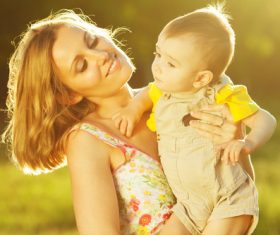 Mother holding child Stock Photo
