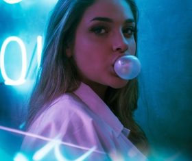 Stock Photo Girl blowing bubbles