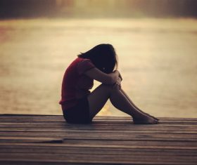 Stock Photo Low head sentimentality woman