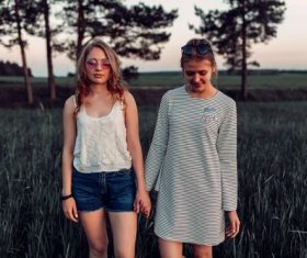 Stock Photo Mother and daughter standing outdoors