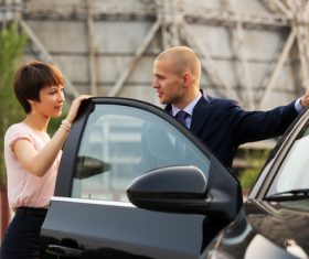 Stock Photo Open the car door for girlfriend