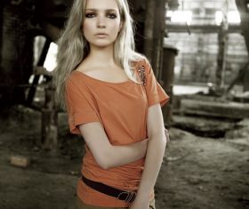 Stock Photo Sad woman in abandoned factory