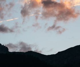 Stock Photo Sky clouds and mountain peaks