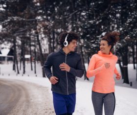 Stock Photo Winter outdoor running lovers