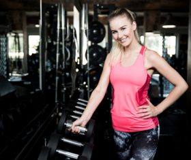 Stock Photo Woman doing body building in gym 04