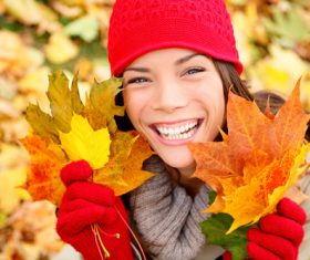 Stock Photo Woman holding autumn leaves in autumn 02