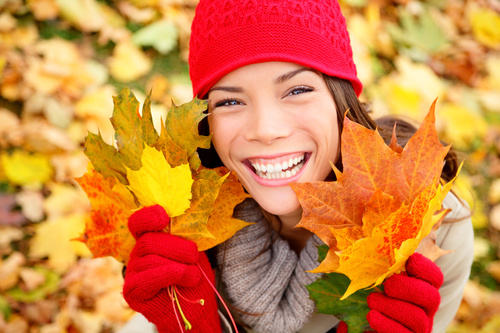Stock Photo Woman holding autumn leaves in autumn 02