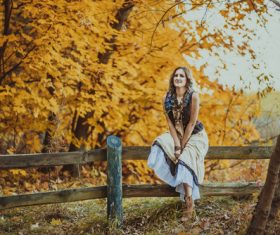 Stock Photo Woman in autumn outdoor pose