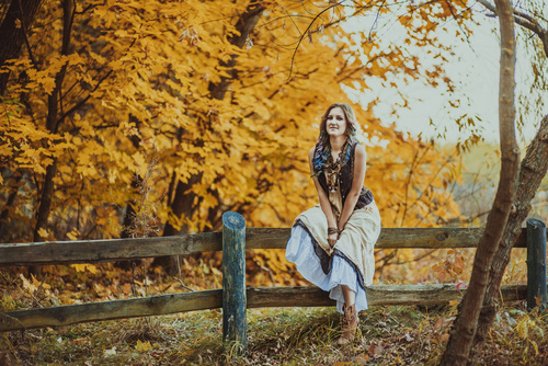 Stock Photo Woman in autumn outdoor pose