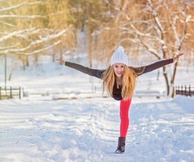 Stock Photo Woman posing on the snow