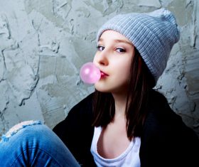 Stock Photo Young girl blowing Bubble Gum 01