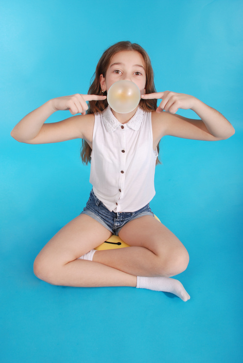 Stock Photo Young girl blowing Bubble Gum 02
