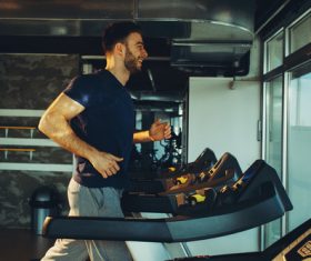 Stock Photo Young man on a treadmill