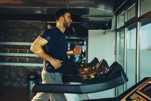 Stock Photo Young man on a treadmill