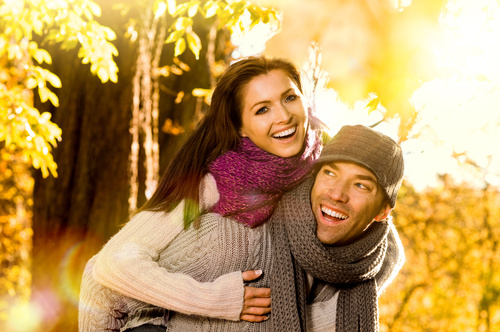 Sweet lovers in the autumn park Stock Photo