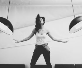 Woman by lights Stock Photo