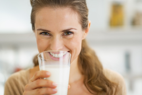 Woman drinking milk Stock Photo 01