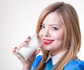 Woman drinking milk Stock Photo 04