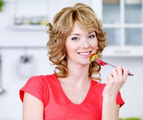 Woman eating vegetable salad Stock Photo 01