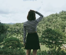 Woman enjoying scenery Stock Photo