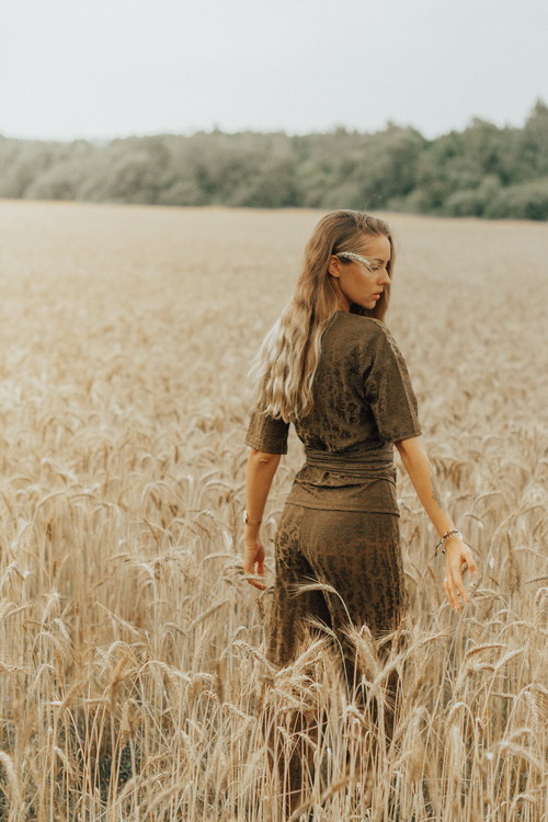 Woman posing in the wheat field Stock Photo